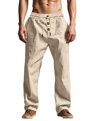 Front view of beige drawstring pants with button front and wide straight legs