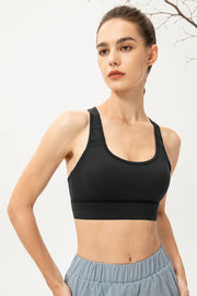 Black scoop-neck sports bra shown from the front
