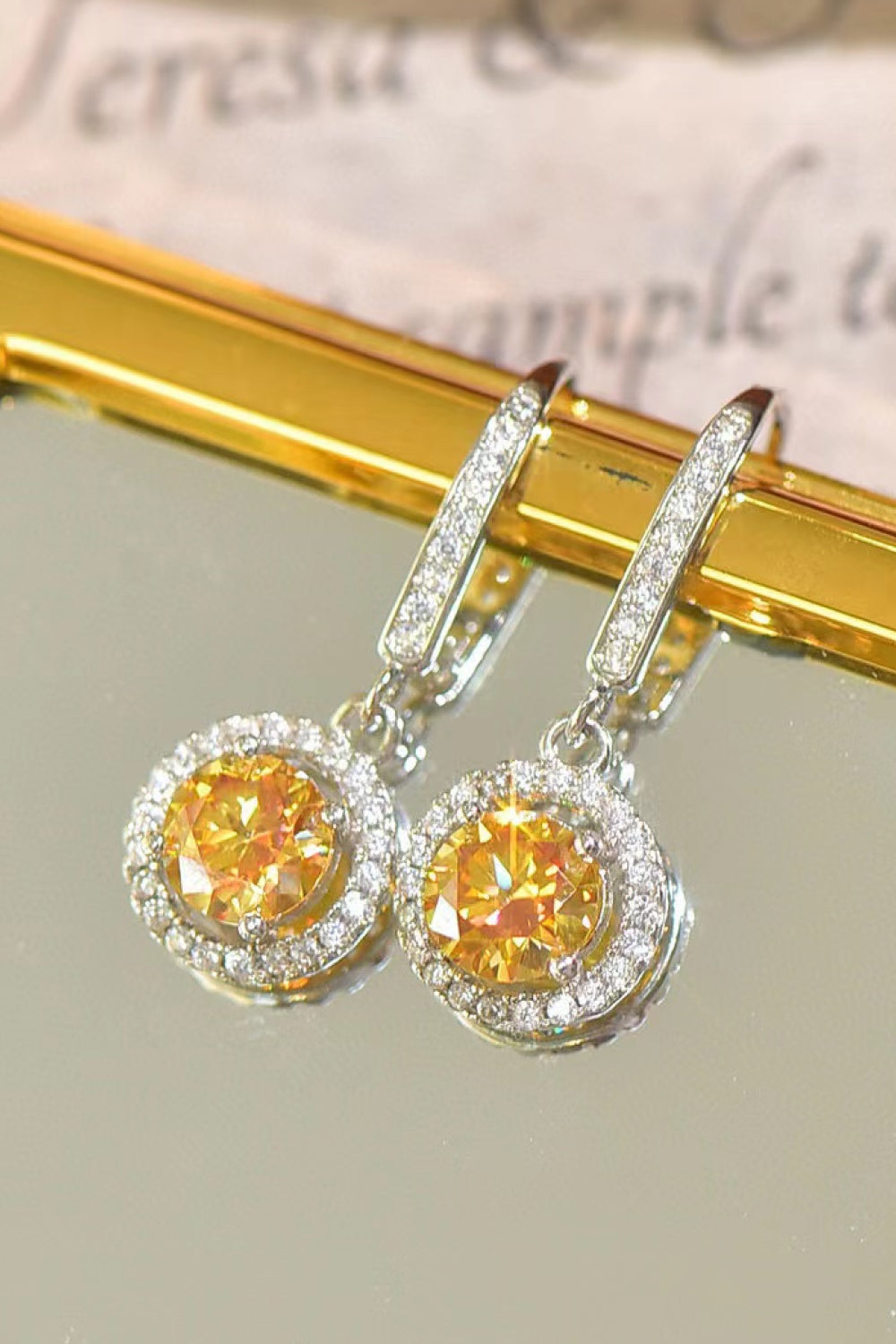 Platinum-Plated 2 Carat Moissanite Drop Earrings — Pair of platinum-plated moissanite drop earrings with yellow stones