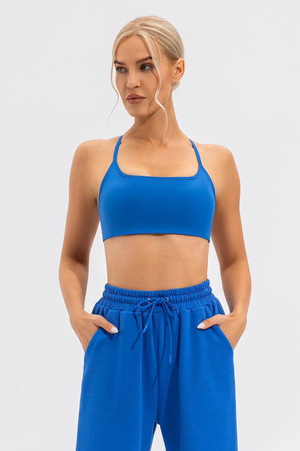 Blue crisscross-back active cami with matching pants