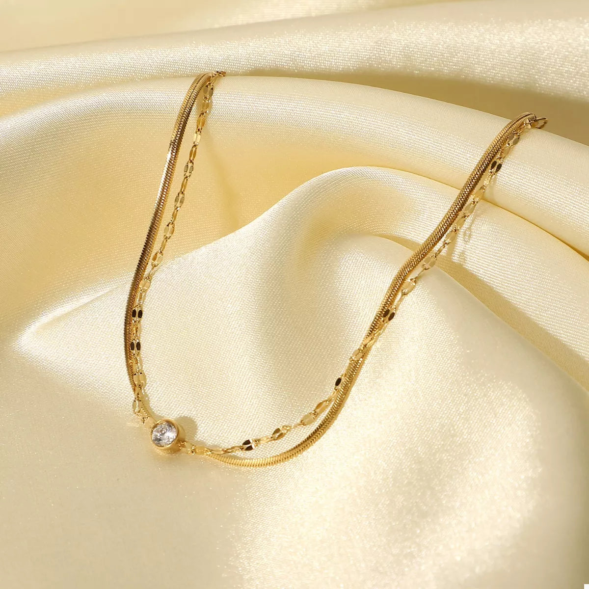 Double-layer gold zircon bracelet displayed flat