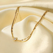 Double-layer gold zircon bracelet displayed flat