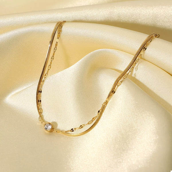 Double-layer gold zircon bracelet displayed flat