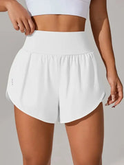 White high-waisted active shorts shown from the front