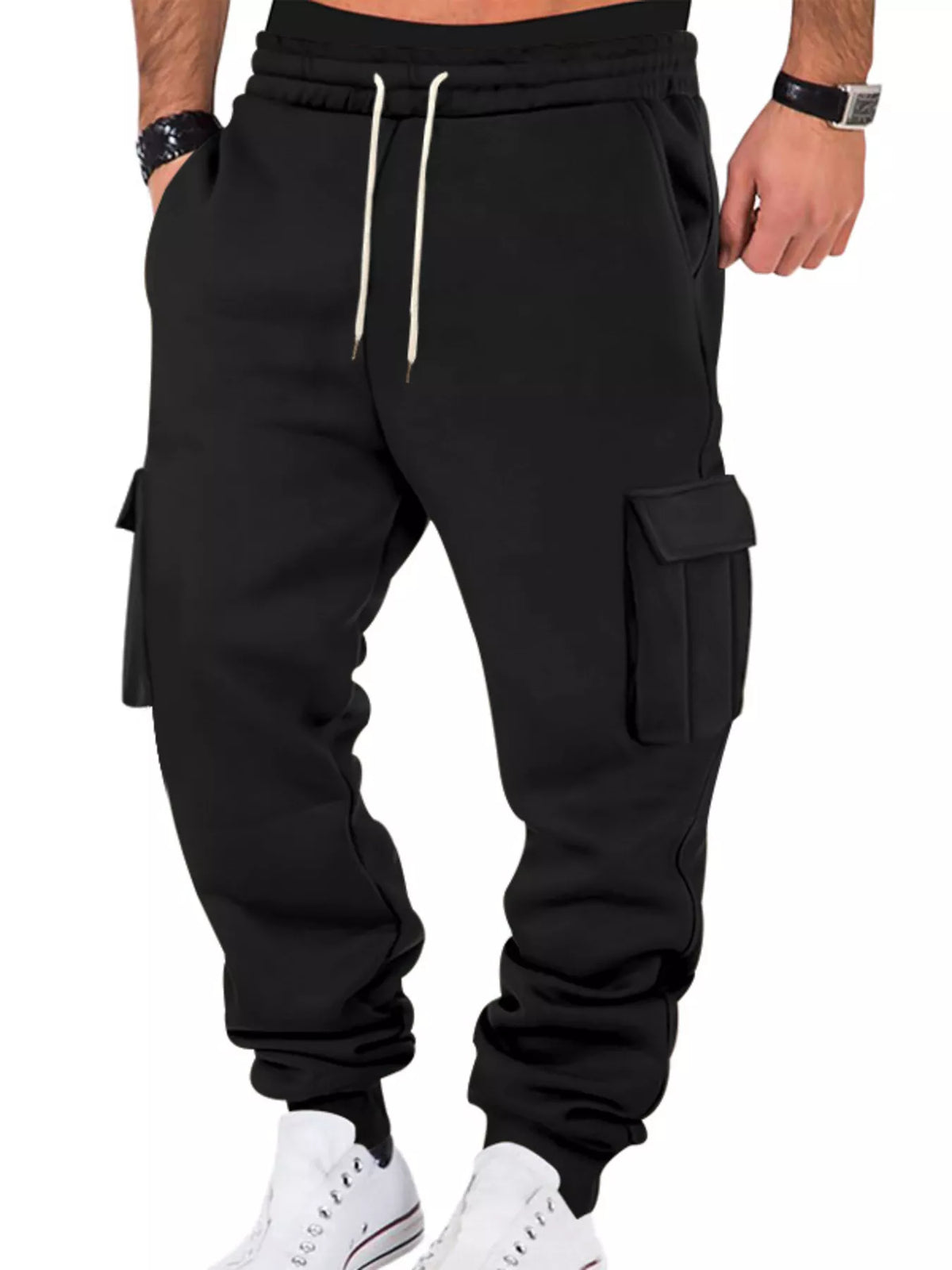 Model wearing black cargo joggers, front view