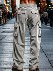 Model wearing gray cargo pants with ribbed corduroy texture