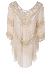 Front view of a black crochet-trimmed cover-up dress