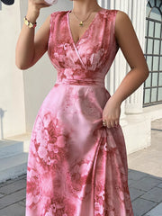Front detail of sleeveless pink floral maxi dress with gathered waist and flowing skirt