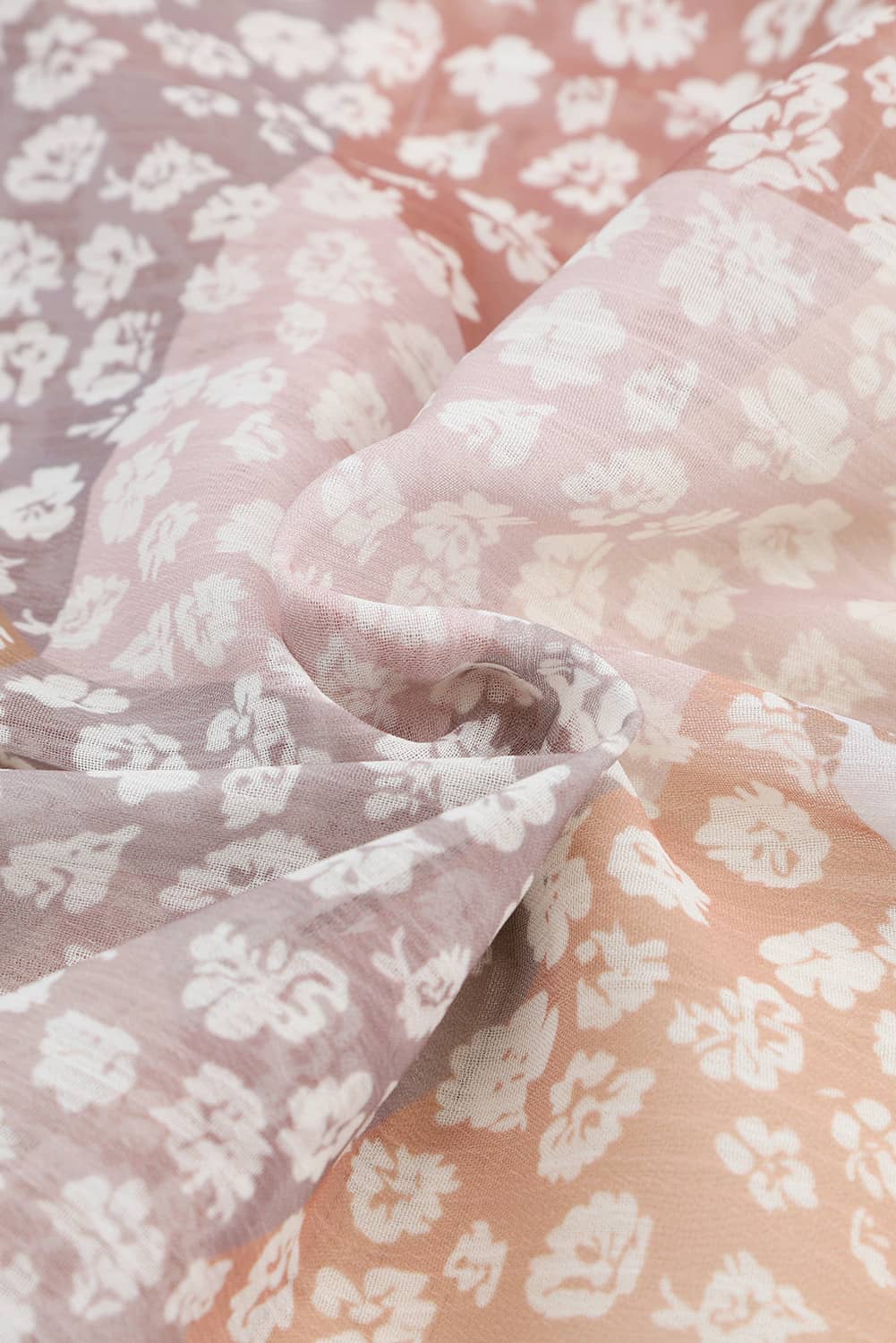 Close-up of sheer peach floral skirt fabric
