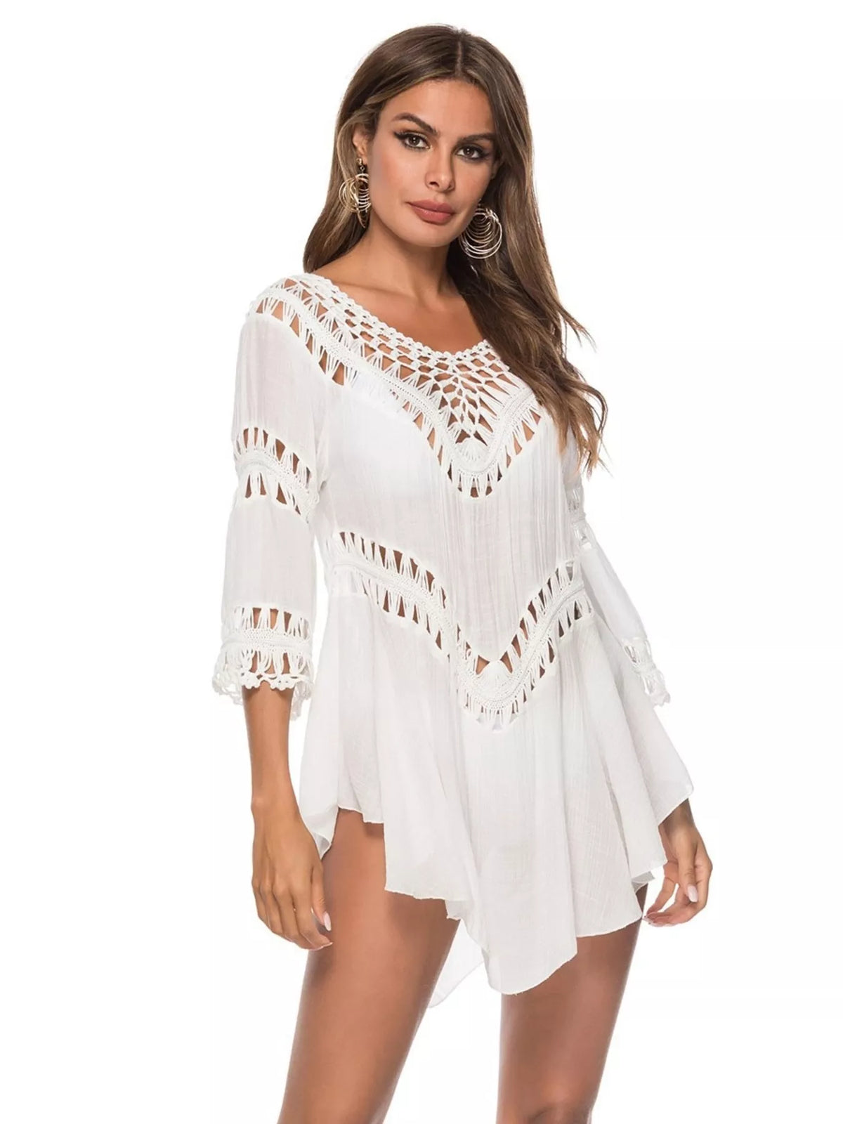 Back view showing the open crochet pattern on the white dress