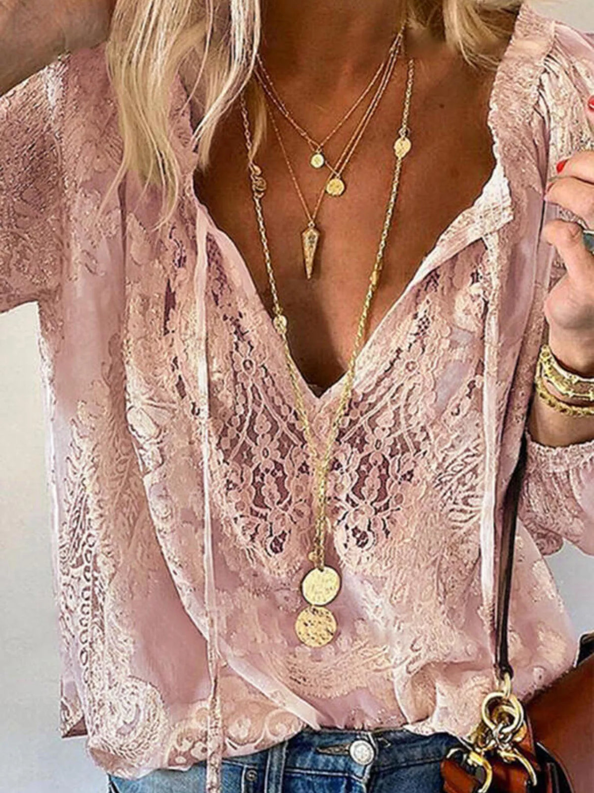 Pink sheer lace blouse with deep V neckline and tie-front detail