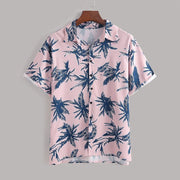 Pink tropical palm-print short-sleeve button-up shirt, front view