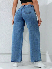 Rear view of blue wide-leg jeans showing two back patch pockets