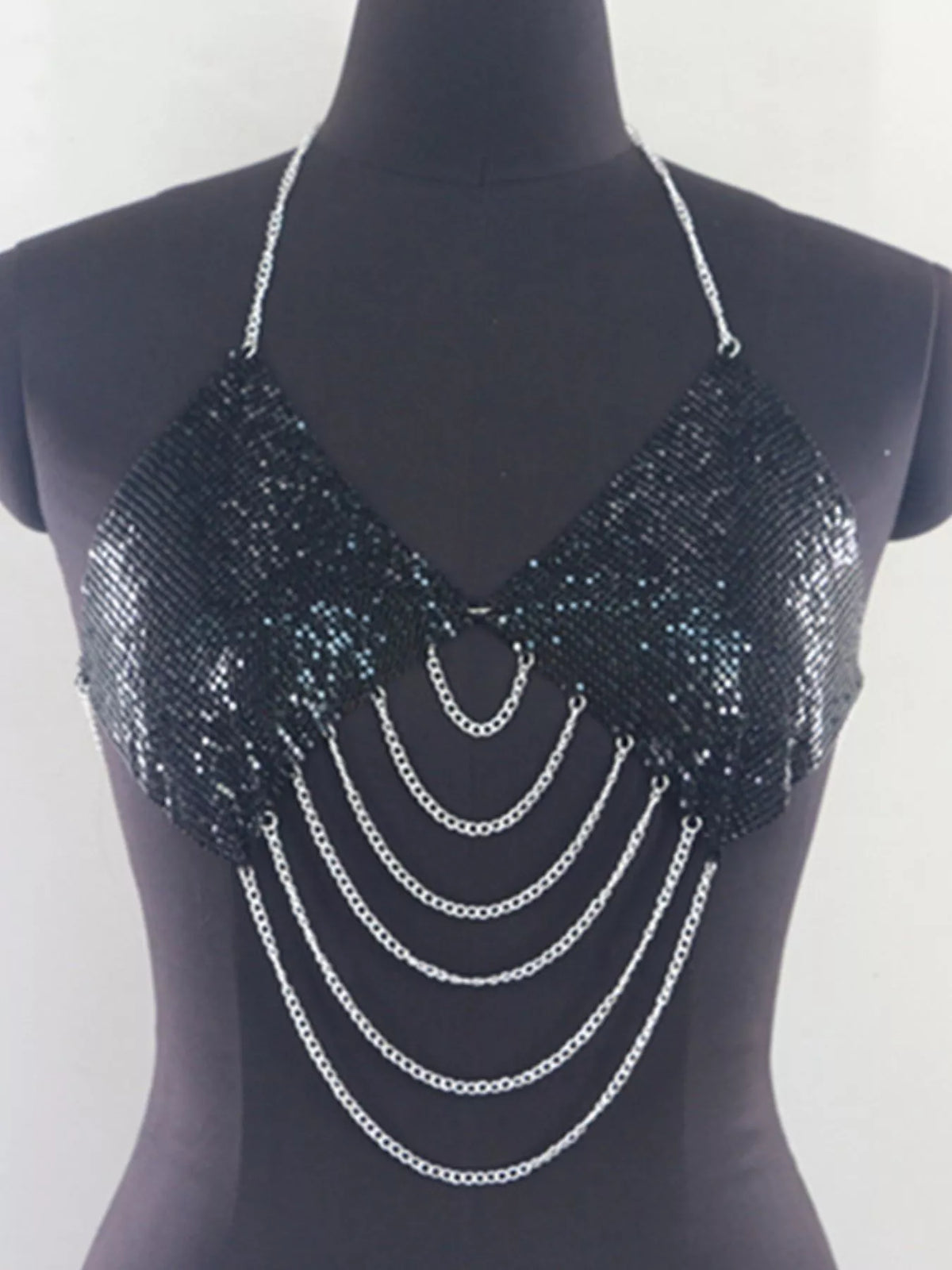 Black metallic chainmail halter cami top with layered silver chain drapes, front view on mannequin
