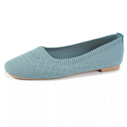 Sky blue mesh slip-on flat shown in profile