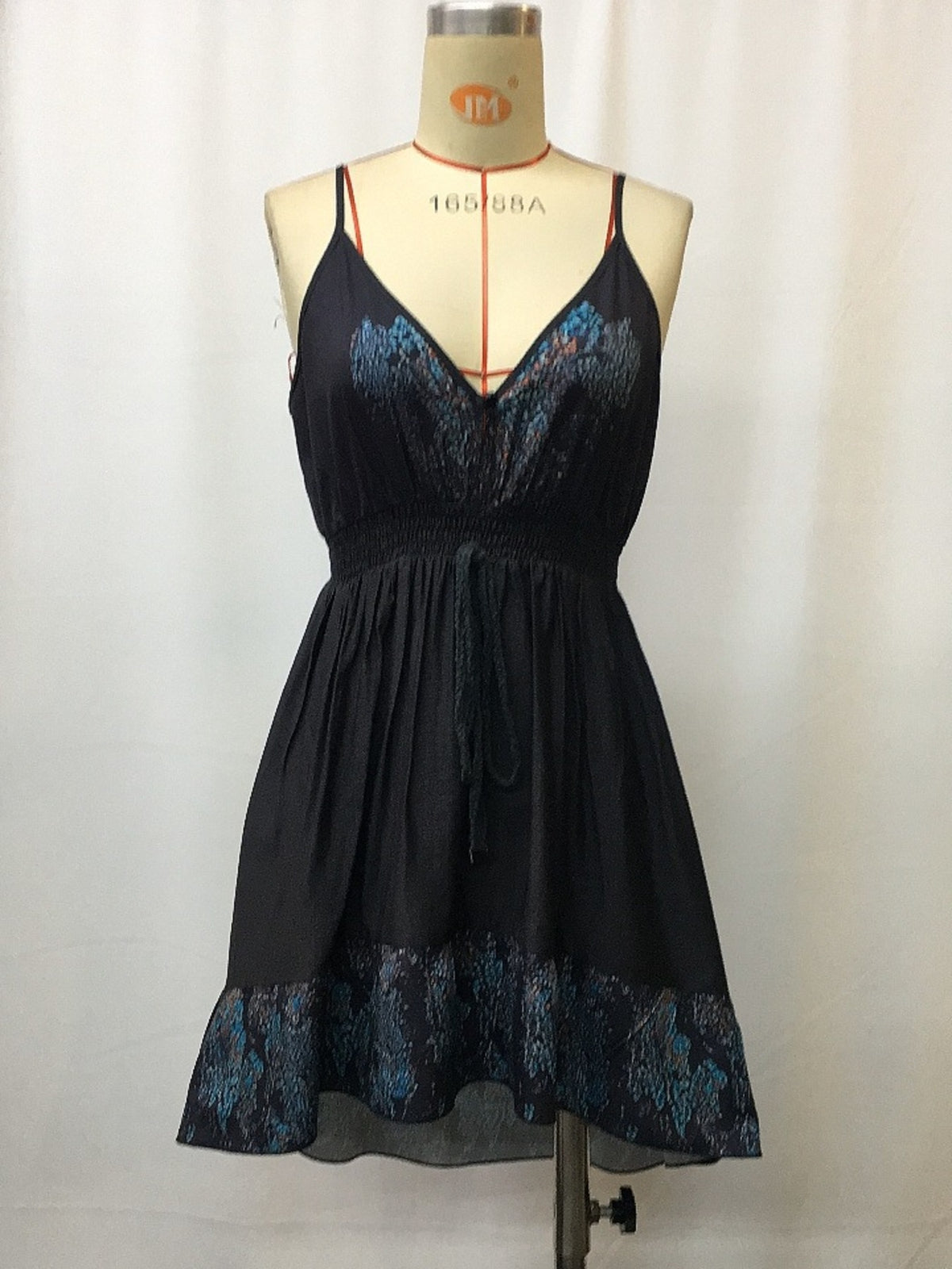 Front view of black dress on mannequin