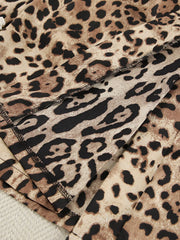 Close-up of gathered edge and leopard-print fabric layers