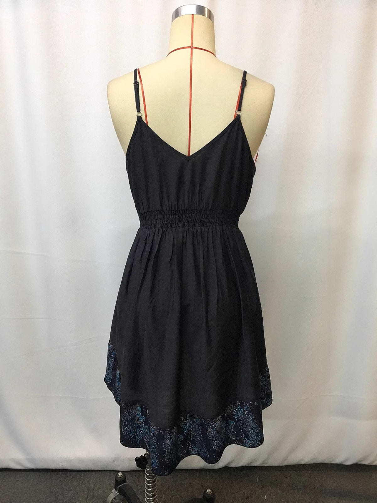 Back view of black dress on mannequin