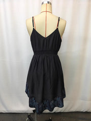 Back view of black dress on mannequin