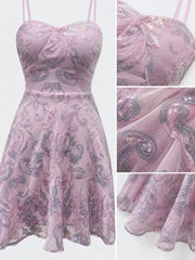 Pale lilac dress detail collage showing the floral-sequin bodice, sheer overlay and hem.