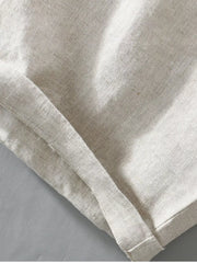 Close-up of white shorts hem and fabric