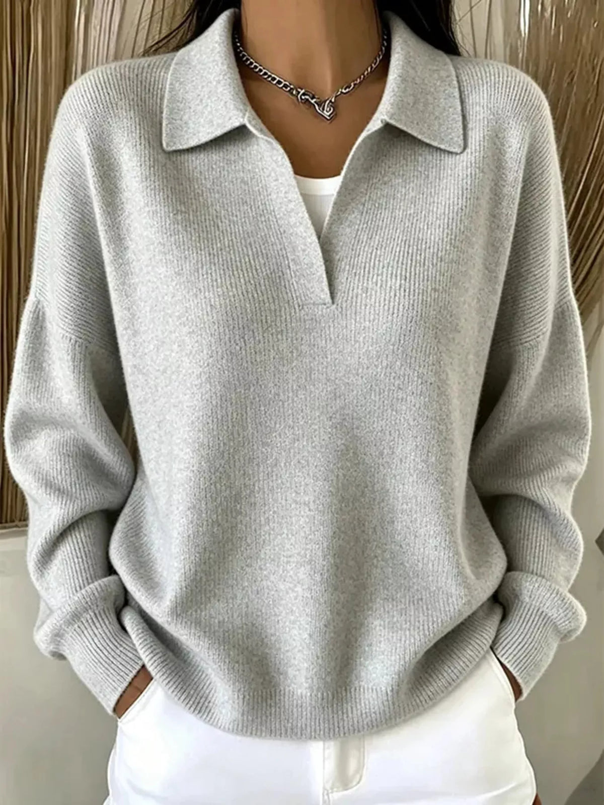 Light gray ribbed polo sweater modeled, front view