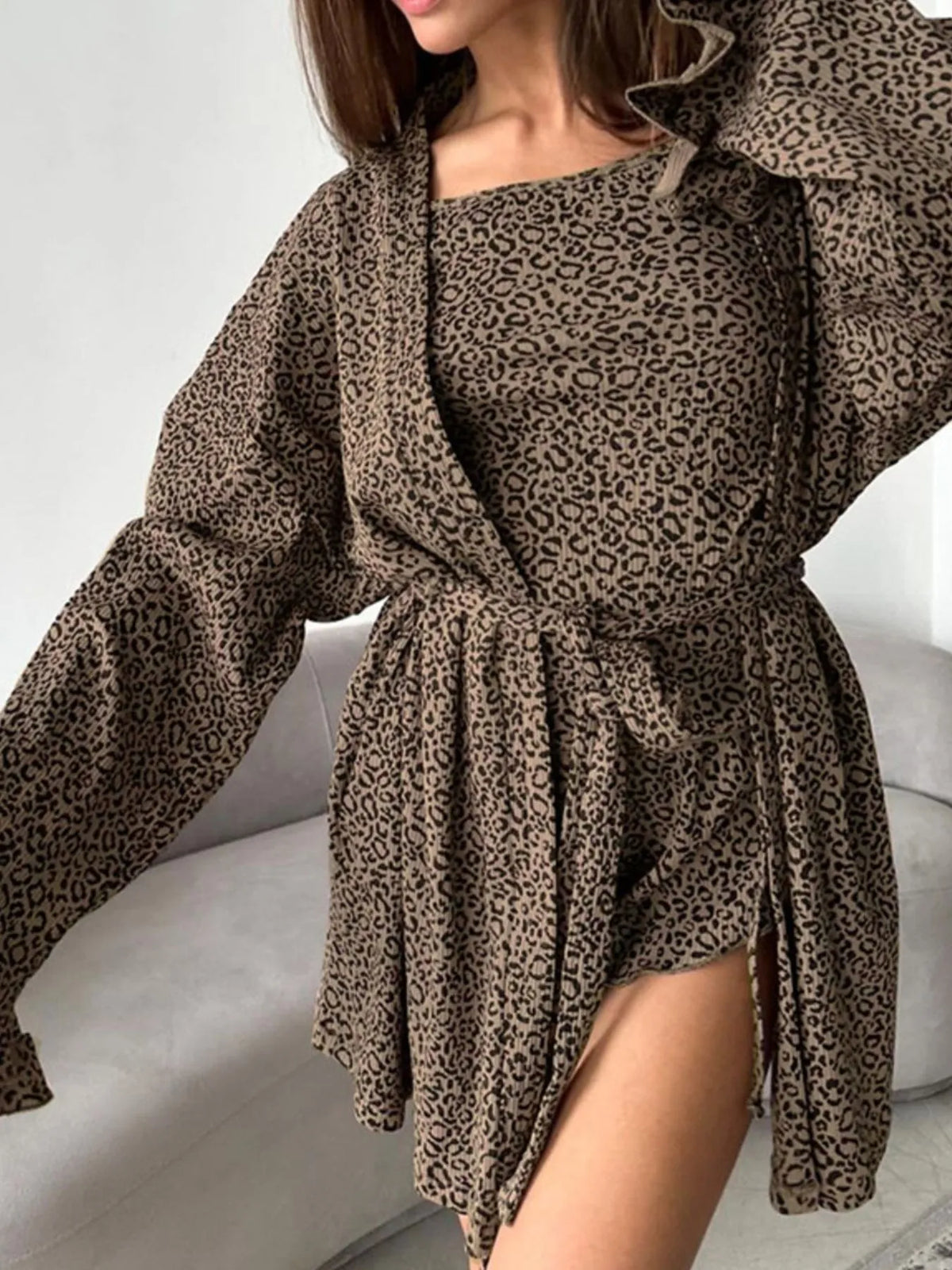 Leopard cardigan worn open over matching cami and shorts