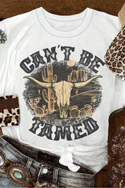 Close-up of Cant Be Tamed graphic on white T-shirt