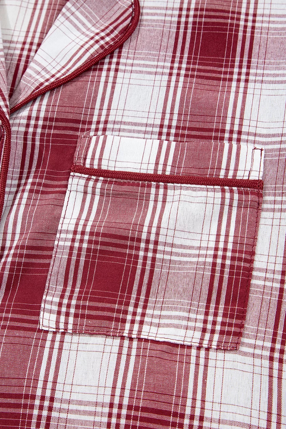 Front view of plaid button-front pajama shirt with pocket