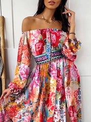 Model wearing the pink floral maxi dress with off-shoulder sleeves and a high slit.