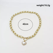 Pearl chain necklace with heart pendant laid flat, with dimensions shown