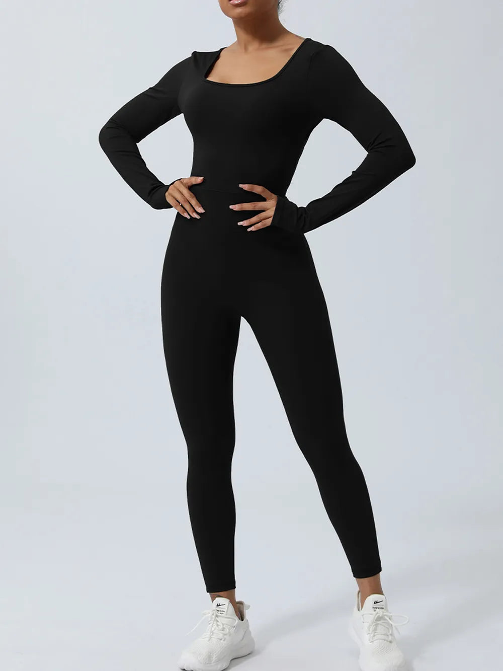 Black long-sleeve jumpsuit shown from the front