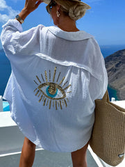 Evil eye embroidered oversized white shirt back view on model