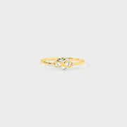 Gold-tone sterling silver ring with interlocking infinity heart motif on white
