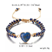 Blue heart beaded bracelet on white with circumference, heart width and weight markings.