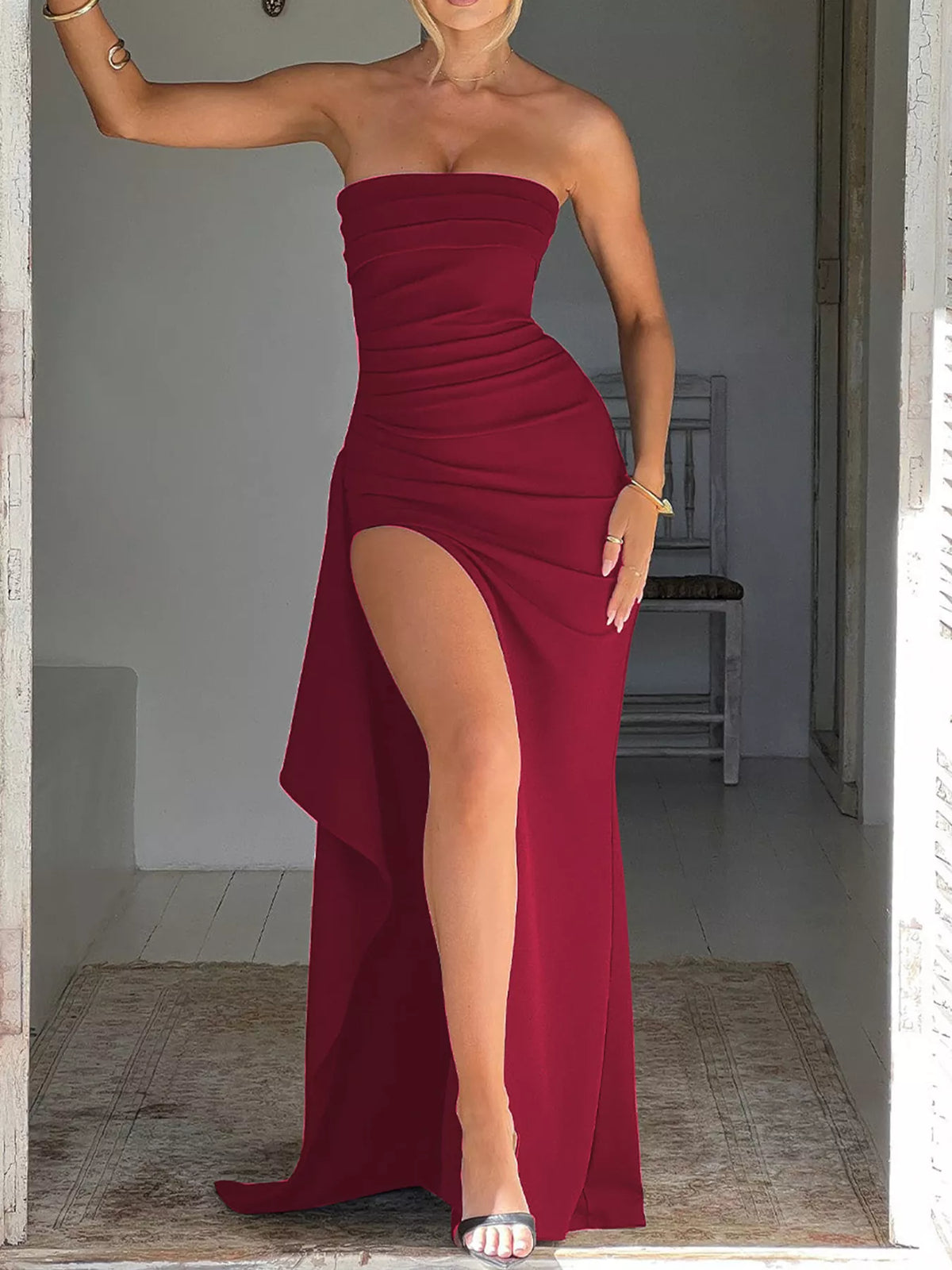 Full-length black strapless ruched maxi dress