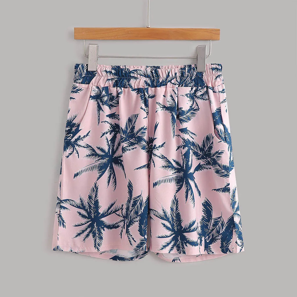 Pink palm-print elastic-waist shorts, front view