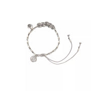 Silver-tone chain bracelet with round charms and long adjustment chains on a white background.