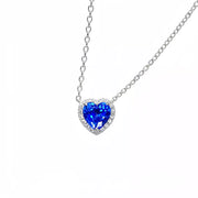 Blue heart-shaped zircon pendant necklace shown against a white background