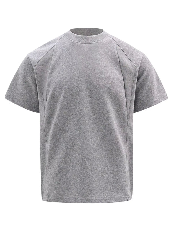 Close-up of gray crewneck T-shirt sleeve and shoulder seam