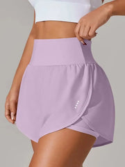 Close-up of lavender shorts waistband and gathered overlay