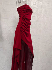 Burgundy ruched strapless dress on display form