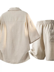 Beige shirt and shorts set displayed from the back.