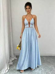 Light blue halter maxi dress shown full length with gathered waist