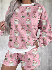 Women's Christmas Santa-Print Top & Shorts Lounge Set: Front view of pink long-sleeve top with repeating Santa faces and matching shorts.