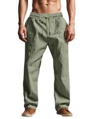 Model wearing olive loose-fit pants, front view