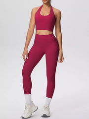 Front view of pink halter-neck crop top and leggings