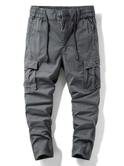 Gray cargo pants with drawstring waist and flap cargo pockets