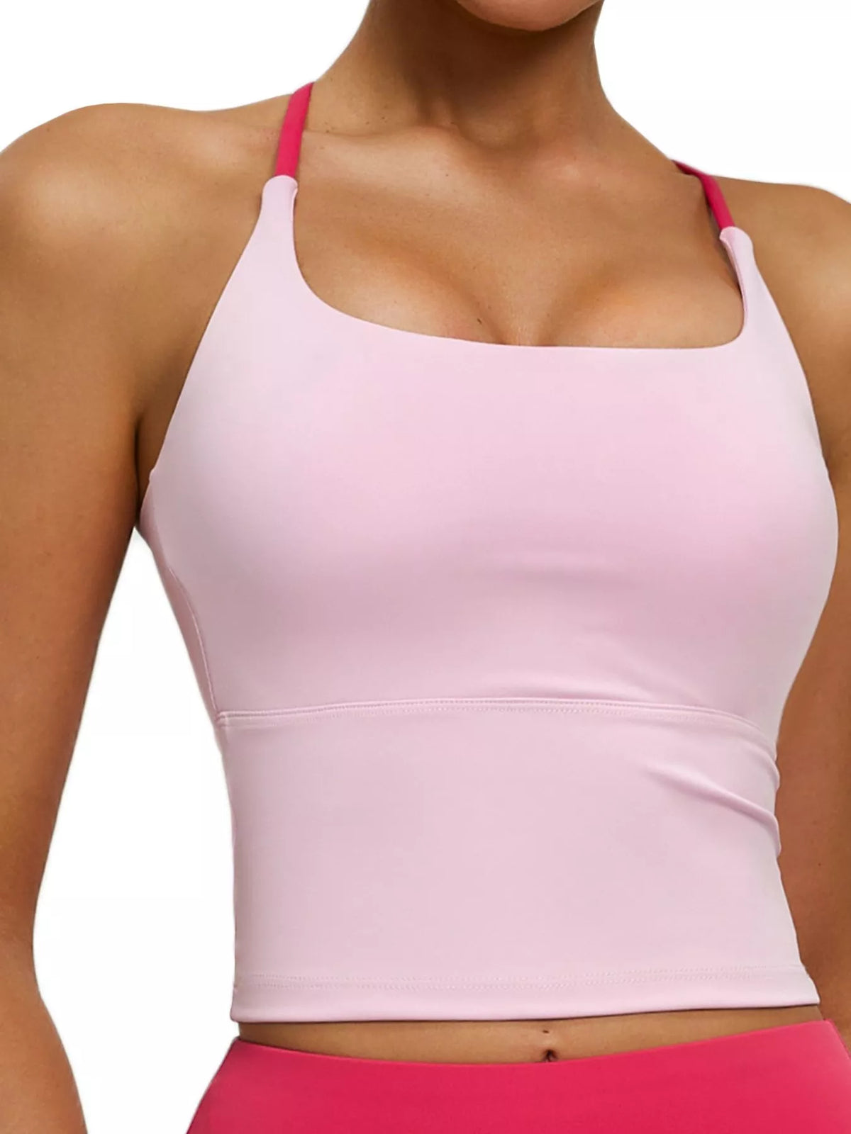 Dusty pink sports bra paired with leggings, front view