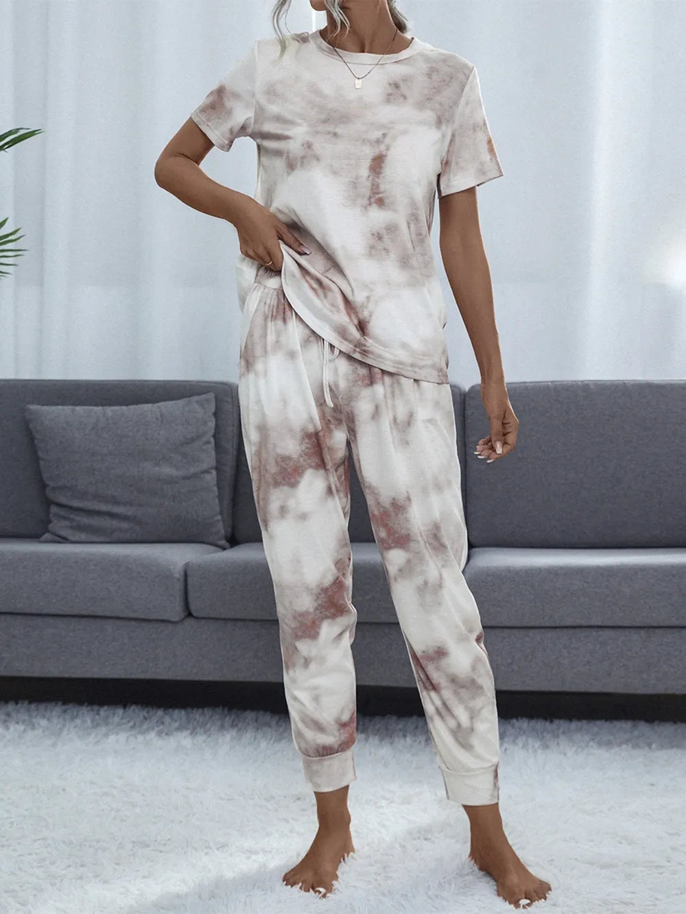 Tie-dye lounge set with short-sleeve top and cuffed pants, front view